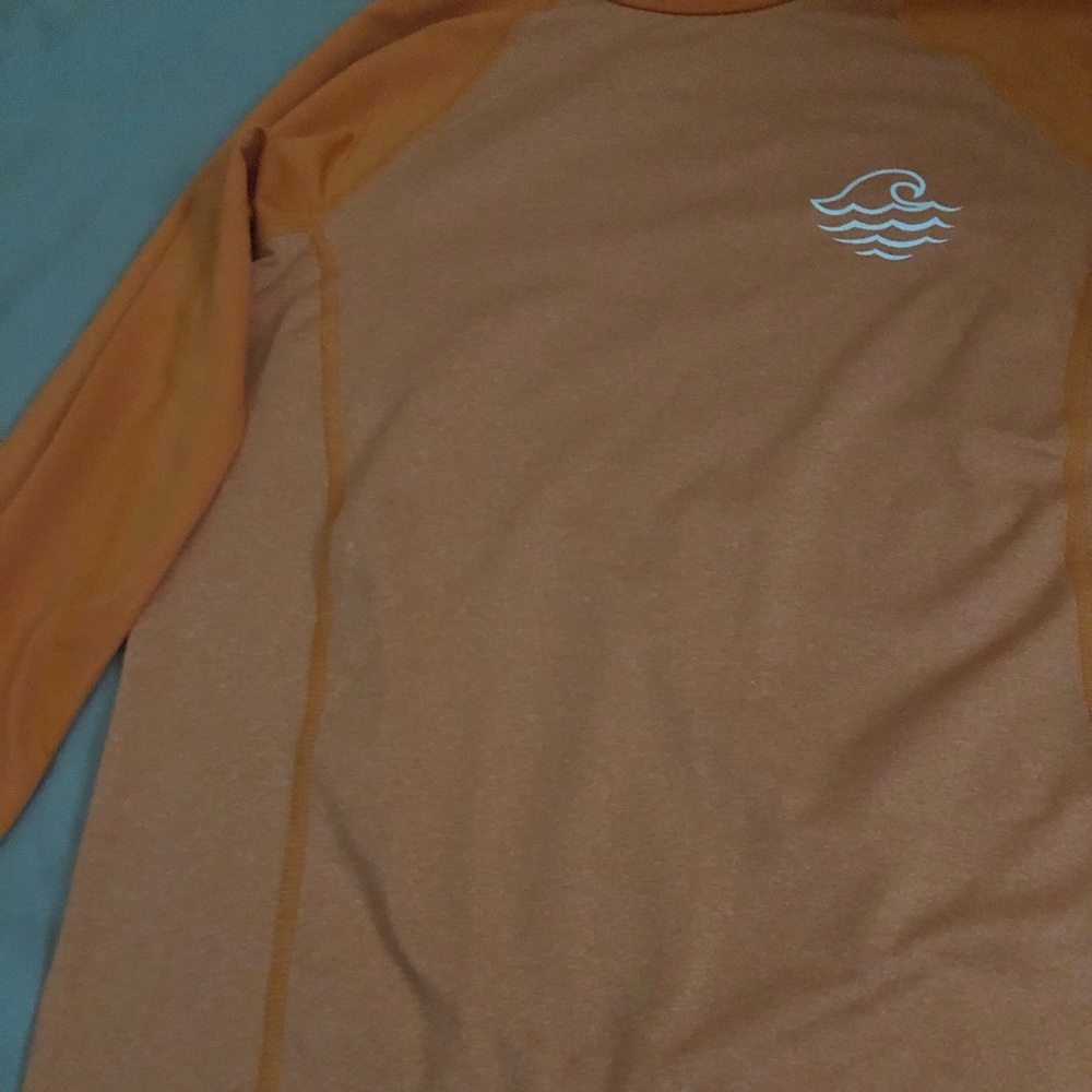 orange swim shirt
